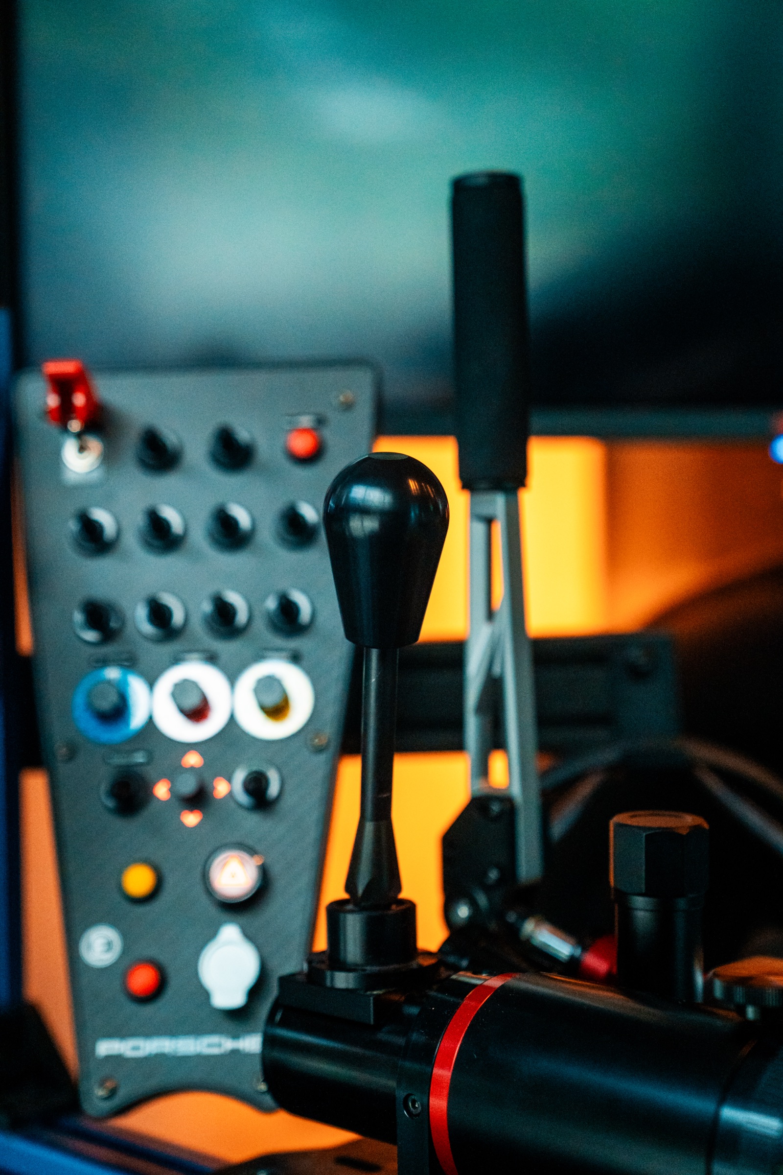 Full-motion racing simulator rig with triple screens in St. Cloud