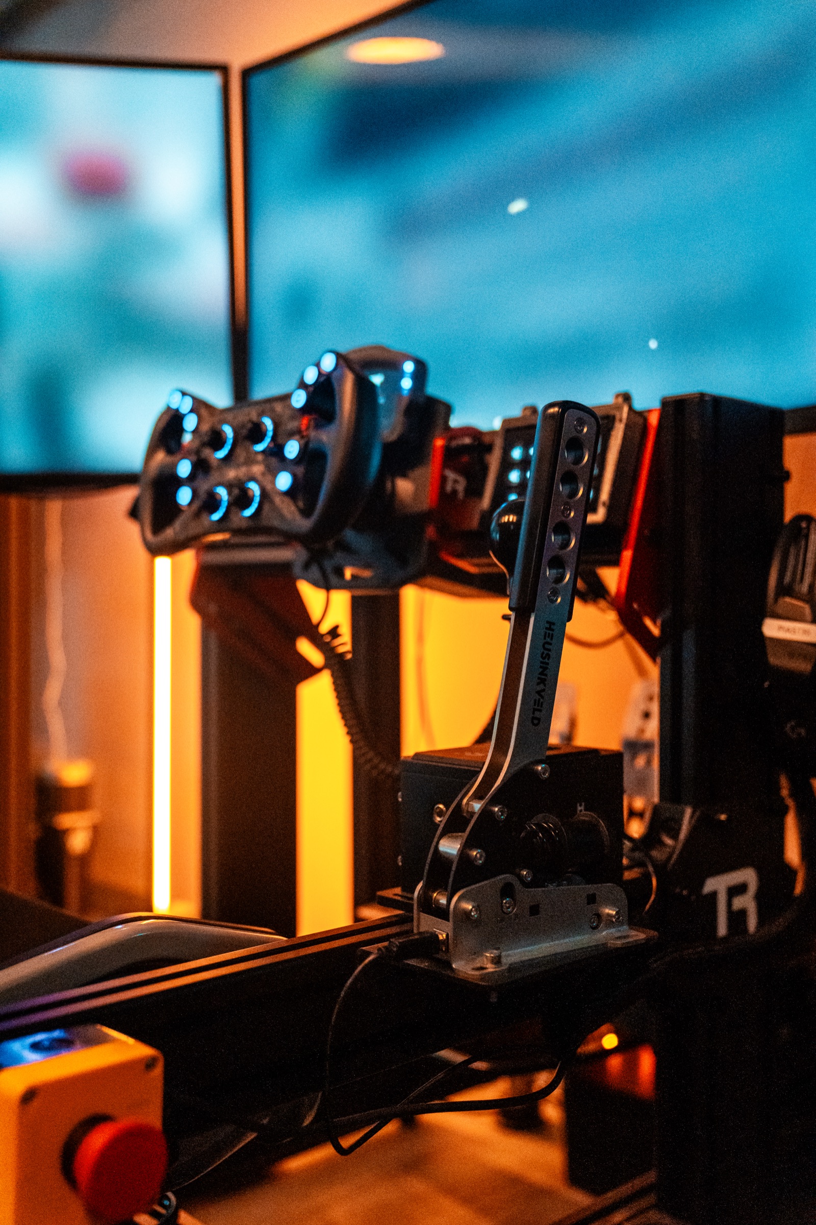 Full-motion racing simulator rig with triple screens in Clewiston