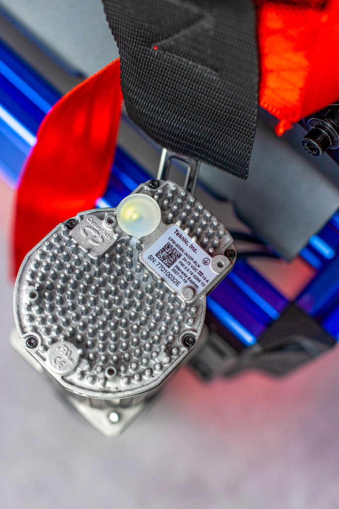 Full-motion racing simulator rig with triple screens in Miami Lakes