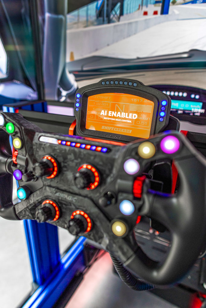 Full-motion racing simulator rig with triple screens in Arcadia