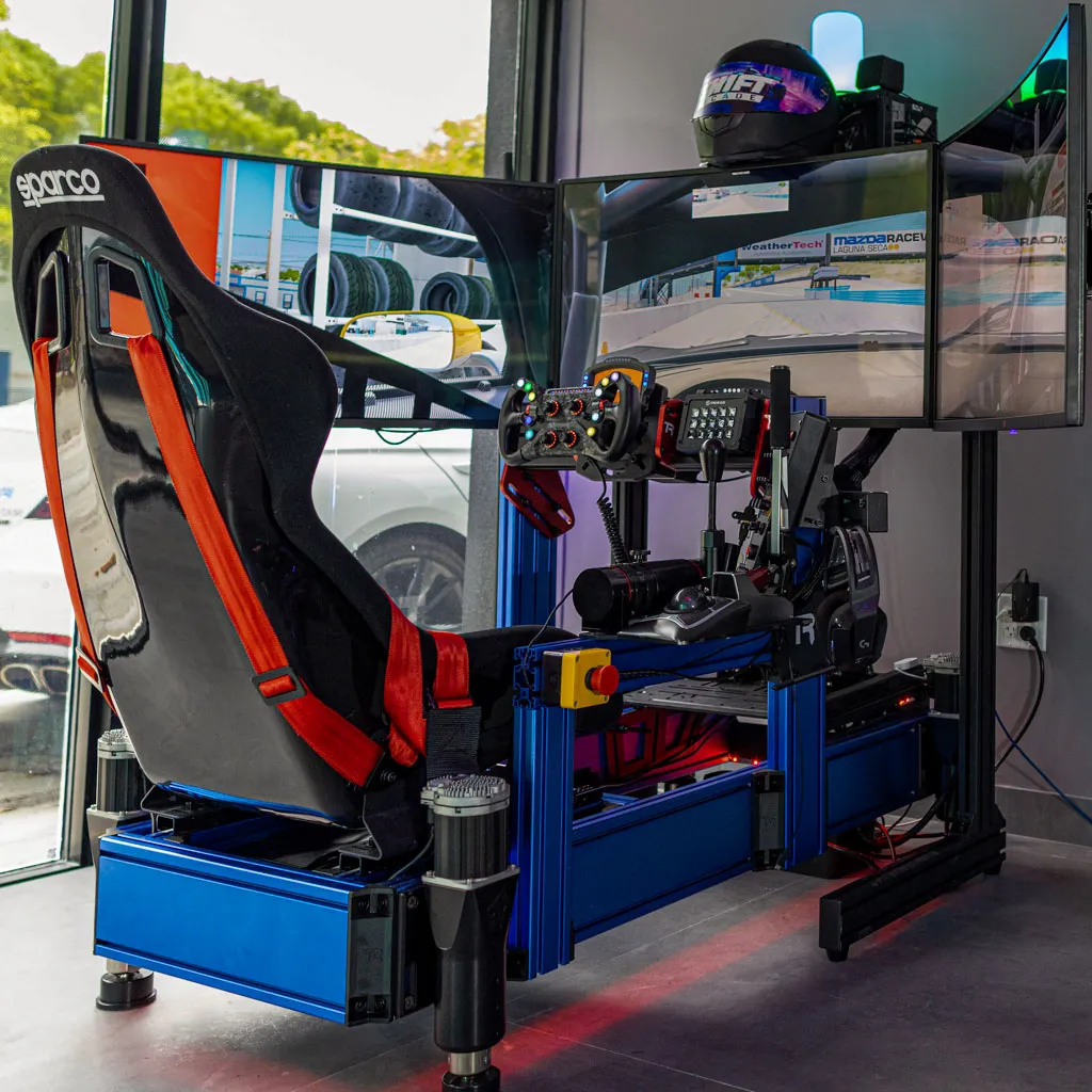 Full-motion simulator rig with racing seat and wheel